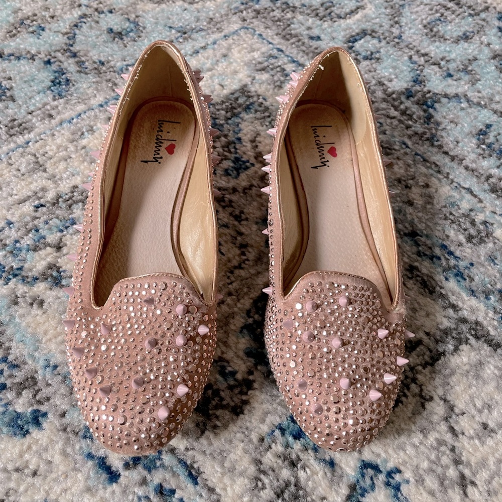 Unique spike and sparkle blush flats